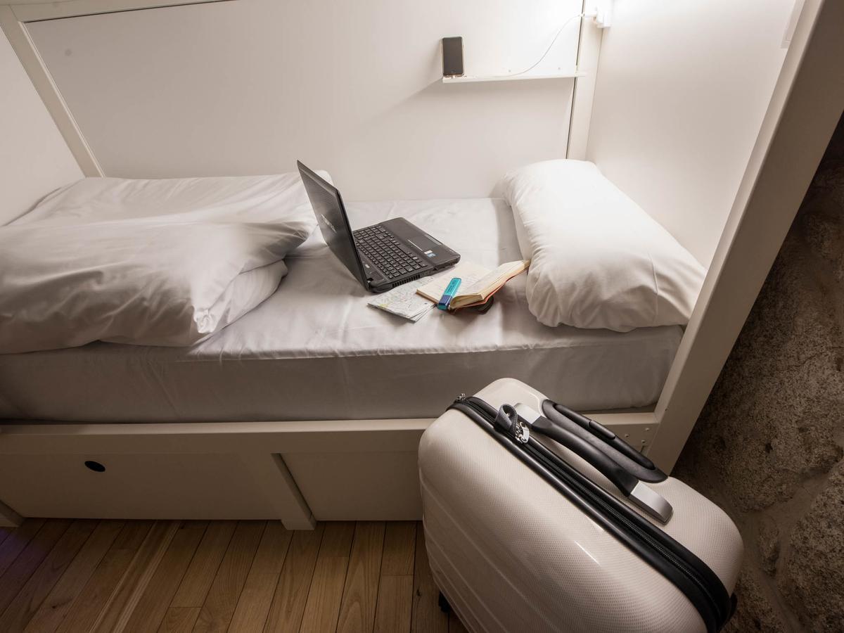 بيت شباب بلوسوك بورتو المظهر الخارجي الصورة A capsule hotel room